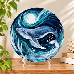 Moonlit Whale Deep Blue Ocean Wall Plate on a tabletop stand