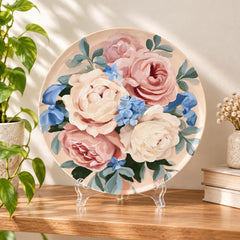 Blush Rose & Blue Blossom Floral Wall Plate on a tabletop stand