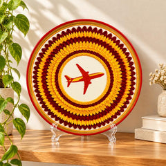 Golden Sun Travel Airplane Wall Plate on a tabletop stand