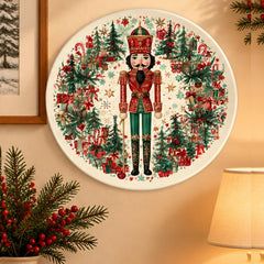 Nutcracker Evergreen Christmas Gift Wall Plate displayed on a wall