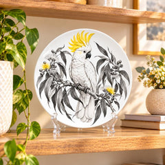 Sulphur Crested Cockatoo Eucalyptus Wall Plate on a tabletop stand