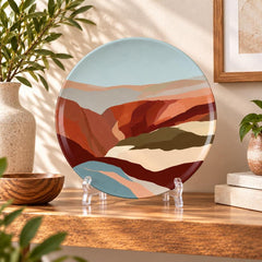 Layered Desert Horizon Decorative Wall Plate on a tabletop stand