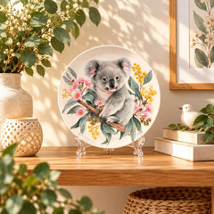 Curious Koala on Eucalyptus Blossoms Wall Plate on a tabletop stand