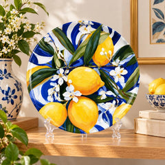 Mediterranean Lemon Blossom Wall Plate on a tabletop stand