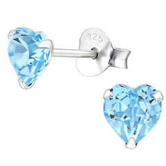 925 sterling silver heart stud earrings with aquamarine-blue Swarovski crystals, polished three-prong settings and butterfly backs, available in Australia.