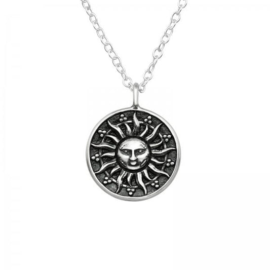 Oxidised 925 sterling silver sun face pendant necklace with detailed celestial rays, a 12 mm round charm and 45 cm chain, available in Australia.
