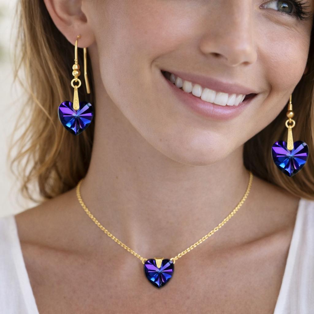 gold necklace and heart-shaped purple earrings