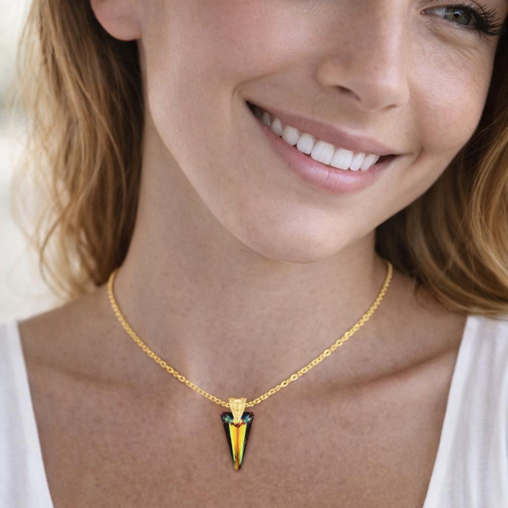 gold necklace with a triangular pendant