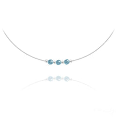 Sterling silver choker necklace with three faceted turquoise beads and polished silver spacers