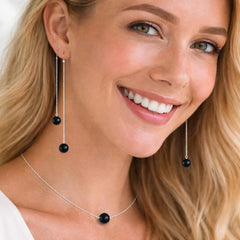 black bead earrings and necklace