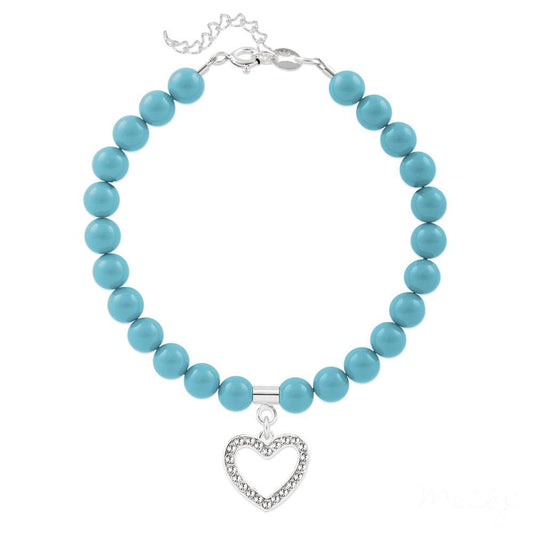 Sterling silver bracelet with smooth turquoise pearl beads, an open heart charm, clear accents and adjustable extension chain