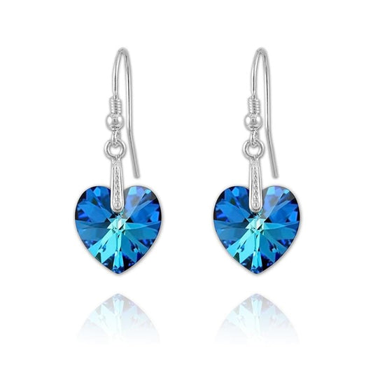 Sterling Silver drop earrings with genuine Bermuda Blue Swarovski crystal heart pendants and rhodium plated finish