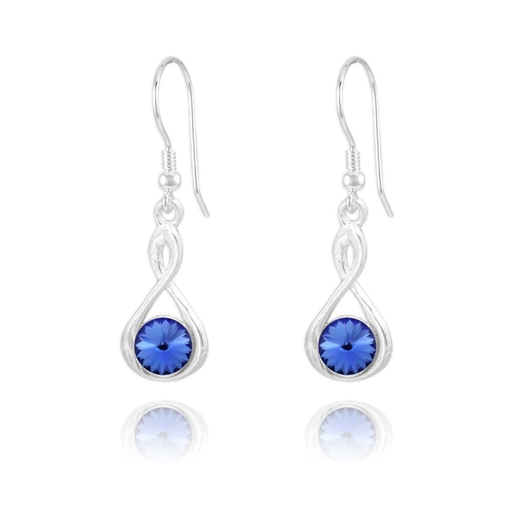 Sterling Silver Sapphire crystal twist drop earrings with rhodium plated finish and round blue crystal