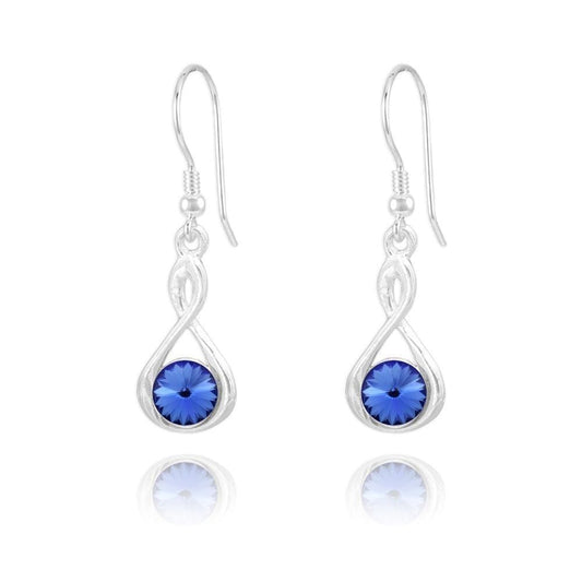 Sterling Silver Sapphire crystal twist drop earrings with rhodium plated finish and round blue crystal