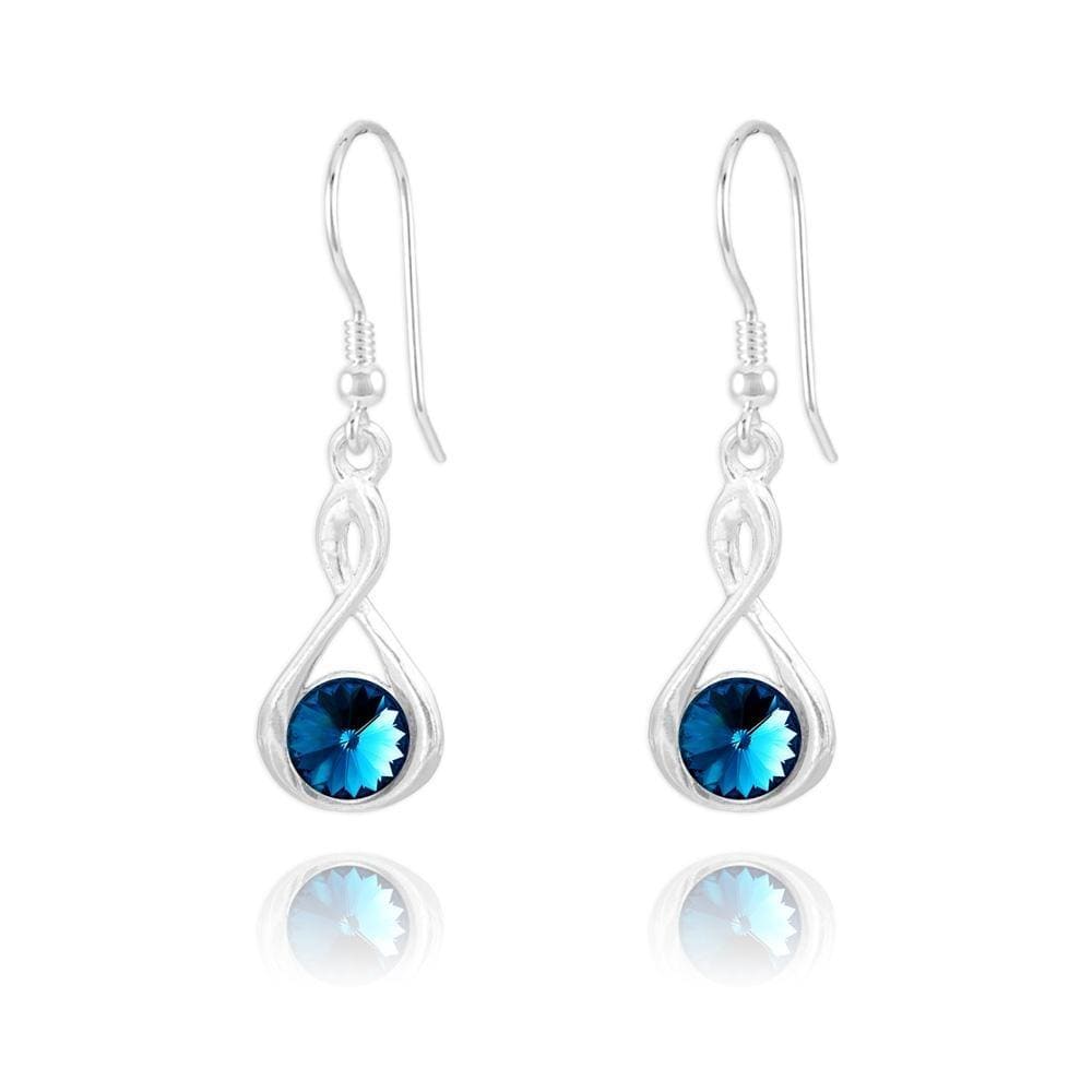 Sterling Silver Bermuda Blue crystal twist drop earrings with rhodium plated finish and round blue crystal