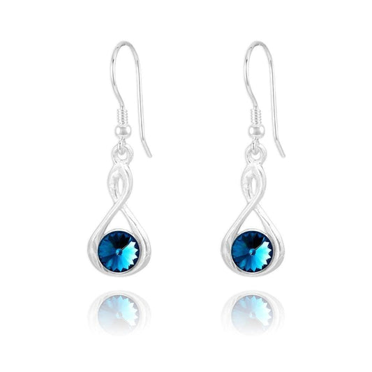 Sterling Silver Bermuda Blue crystal twist drop earrings with rhodium plated finish and round blue crystal