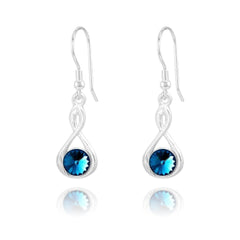 Sterling Silver Bermuda Blue crystal twist drop earrings with rhodium plated finish and round blue crystal