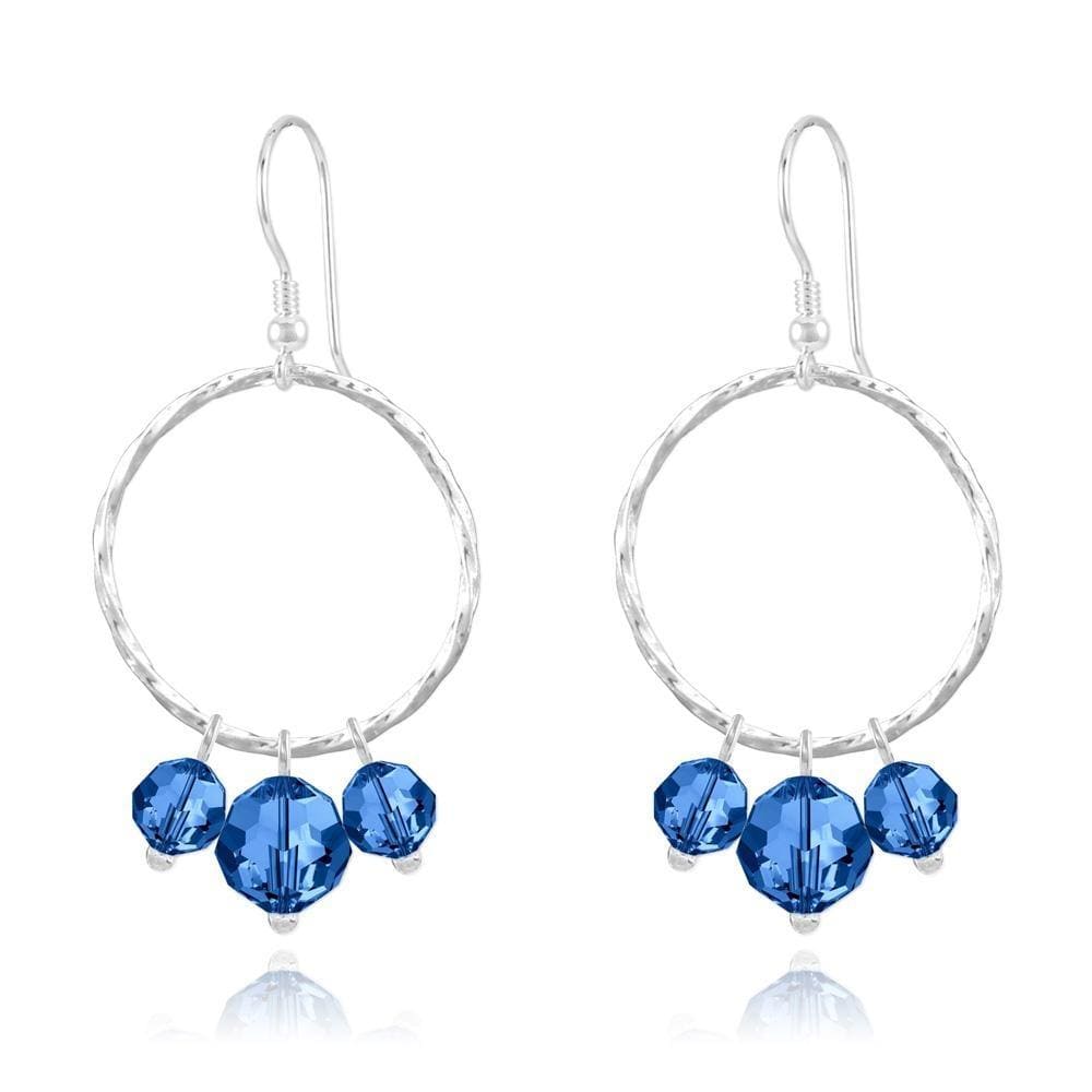 Sterling Silver hoop drop earrings with Capri Blue crystal beads and rhodium plated finish
