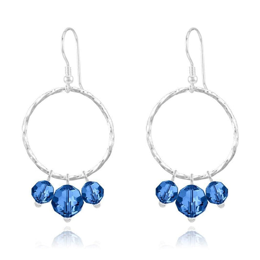 Sterling Silver hoop drop earrings with Capri Blue crystal beads and rhodium plated finish