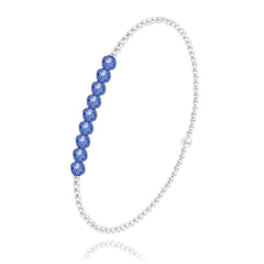 Sterling Silver sapphire blue crystal stretch bracelet with faceted blue crystals and rhodium plated finish