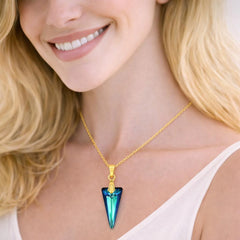 gold necklace with a blue pendant