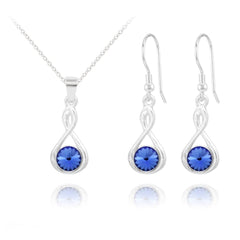 Sterling Silver infinity jewellery set with blue Swarovski crystal pendant necklace and matching drop earrings