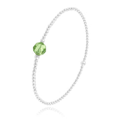 Sterling Silver stretch bracelet with green Peridot Swarovski crystal and rhodium plated finish