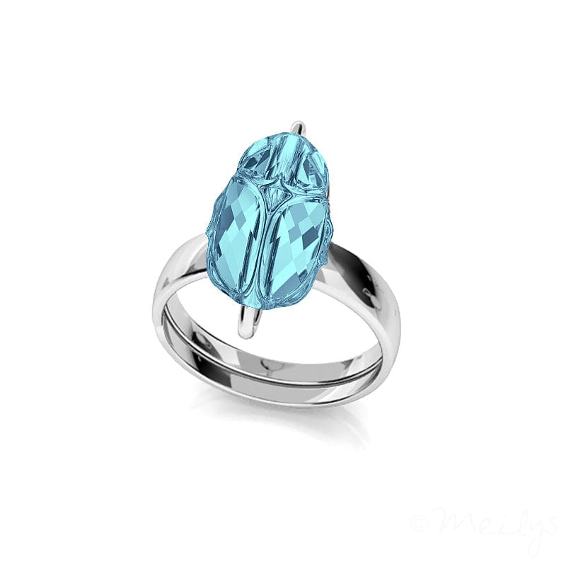 Sterling Silver adjustable ring featuring a light blue crystal in a scarab-inspired design with a polished finish