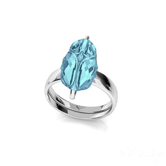 Sterling Silver adjustable ring featuring a light blue crystal in a scarab-inspired design with a polished finish