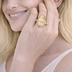 gold ring with a large gemstone