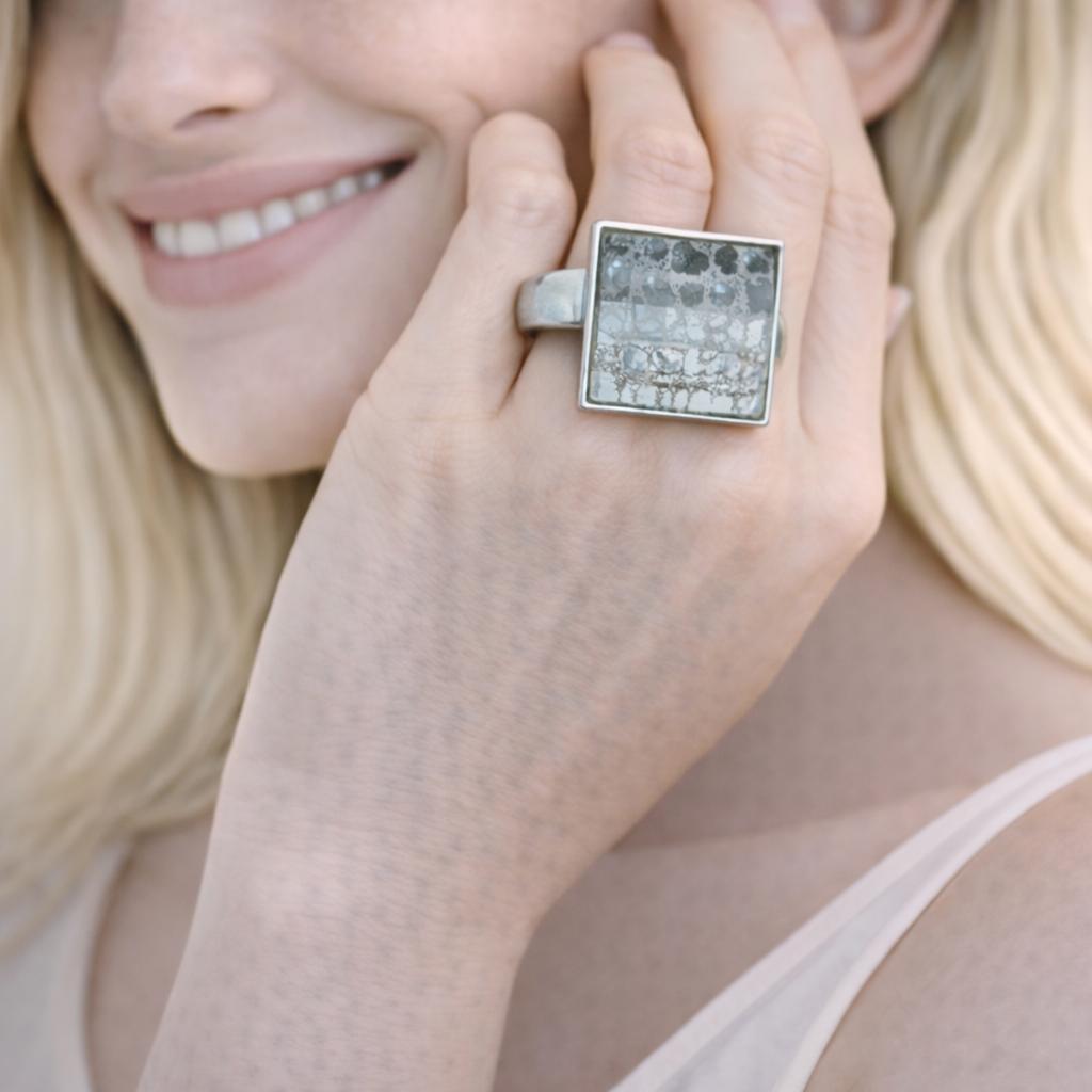 silver ring with a textured design