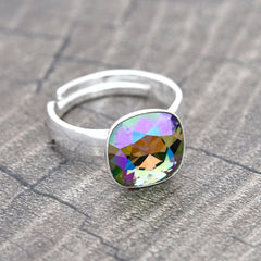 Adjustable rhodium plated sterling silver ring with Paradise Shine crystal in a cushion-cut setting