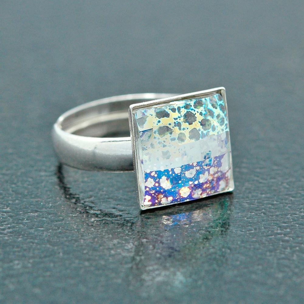 Sterling Silver adjustable square ring with white patina crystal design and polished finish