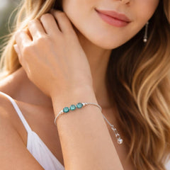 silver bracelet with blue stones