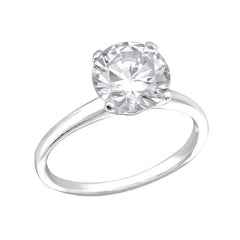 Sterling silver solitaire engagement ring with an 8 mm round cubic zirconia, four-prong setting and polished band in US sizes 5–9, Australia.