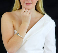 Solid Sterling silver bangle bracelet with blue green bead