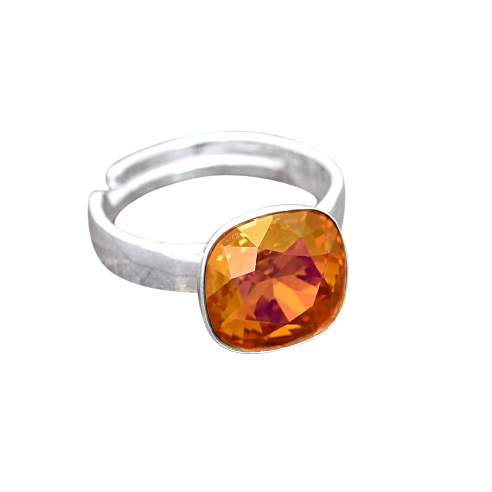 Sterling Silver adjustable ring with an astral pink faceted crystal in a polished bezel setting