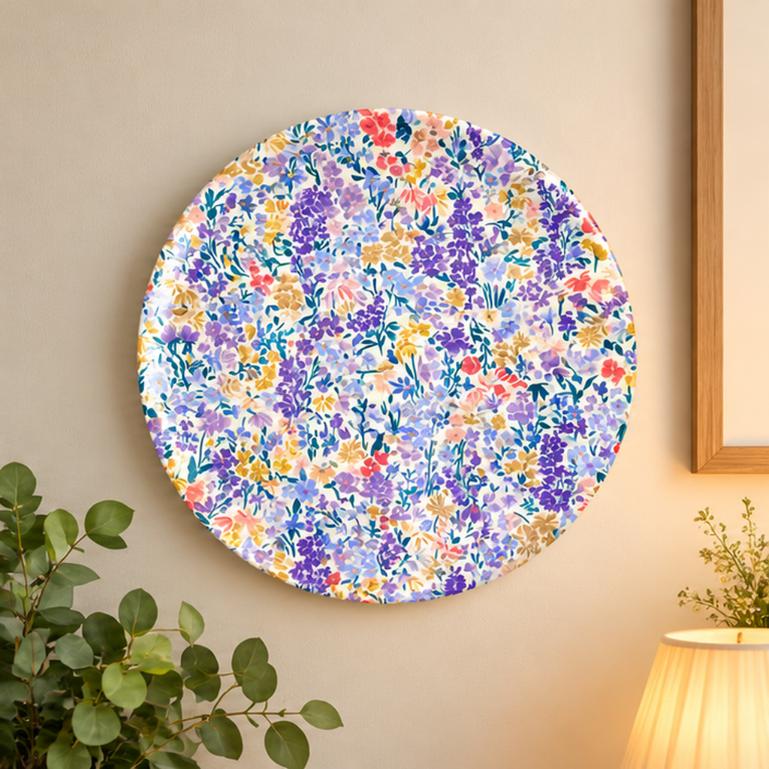 Pastel Wildflower Meadow Wall Plate displayed on a wall