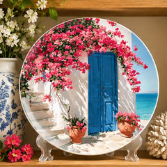 Santorini Bougainvillea Blue Door Wall Plate on a tabletop stand