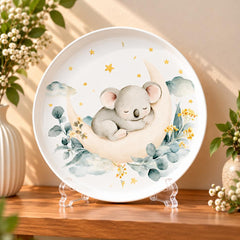 Sleeping Koala on a Crescent Moon Wall Plate on a tabletop stand