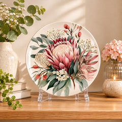 Blush Pink Protea Native Botanical Wall Plate on a tabletop stand