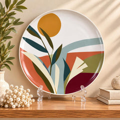Terracotta Sunrise Botanical Wall Plate on a tabletop stand