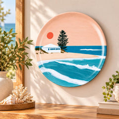Seaside Cottage Turquoise Wave Wall Plate displayed on a wall