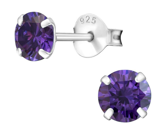 Sterling silver 5 mm garnet birthstone stud earrings with deep red round stones, four-prong settings and butterfly backs, available in Australia.