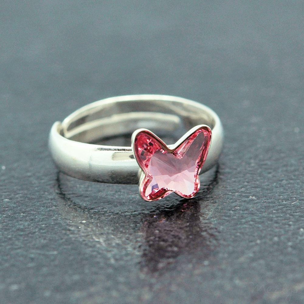 Adjustable rhodium-plated sterling silver ring with a genuine Light Rose Swarovski crystal butterfly