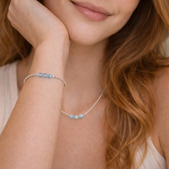 delicate necklace and bracelet with blue stones.