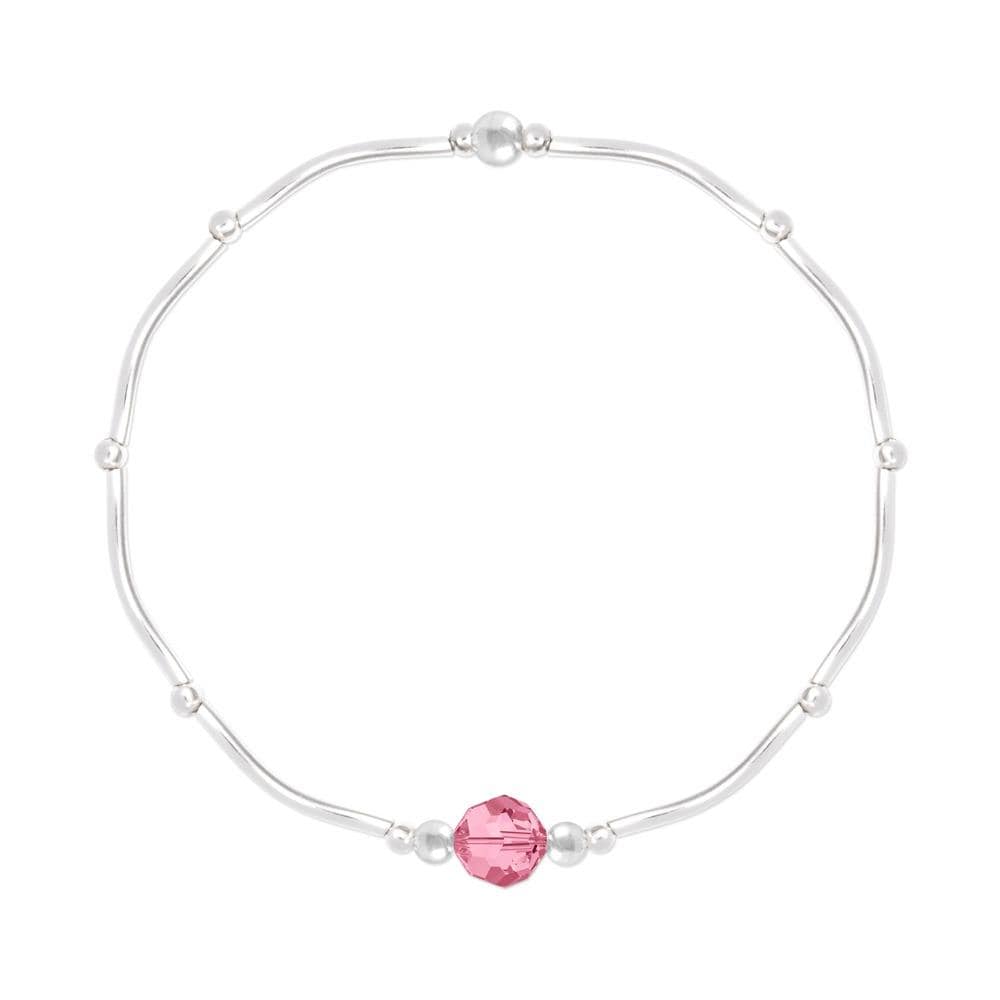 Sterling silver stretch bracelet with Light Rose pink crystal, rhodium plated finish and polished silver bead accents