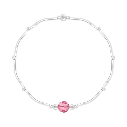 Sterling silver stretch bracelet with Light Rose pink crystal, rhodium plated finish and polished silver bead accents