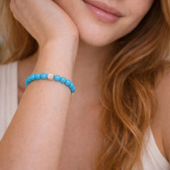 blue beaded bracelet.