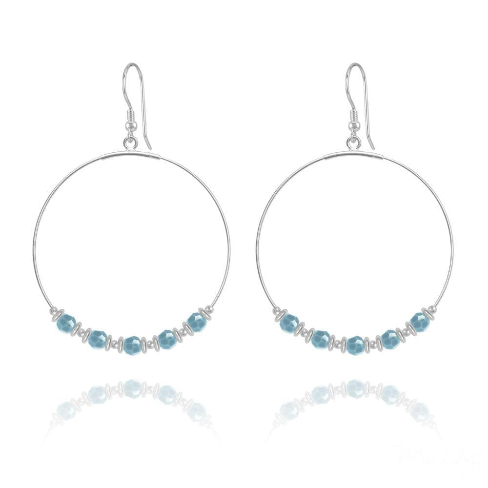 Large sterling silver hoop earrings with genuine turquoise Swarovski crystals, silver spacers and earwire hooks